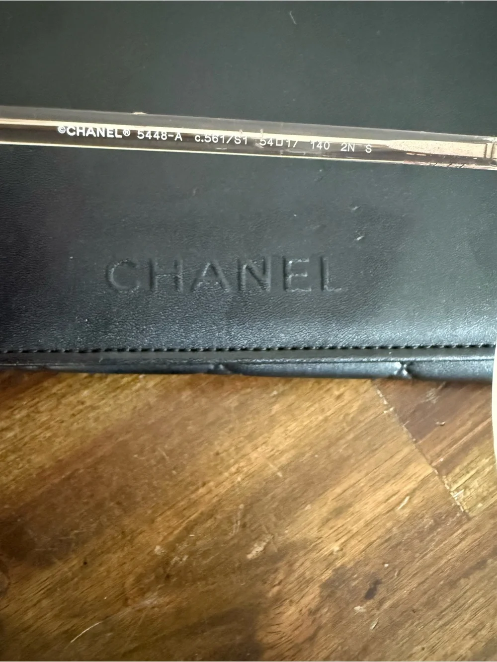 CHANEL Transparent Light Pink Round Sunglasses with Dark Lenses